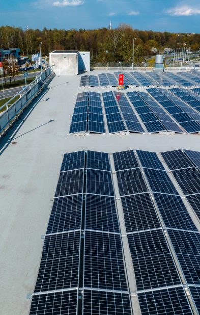 Aerial view of the Spice shopping mall in Riga, Latvia. Roof is covered with solar panels.