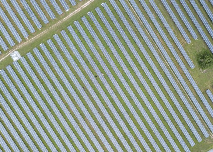 Aerial shot of solar panels. Blue solar panels. photovoltaic modules for renewable energy.